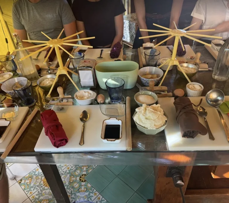 Guests around the table making tiramisù