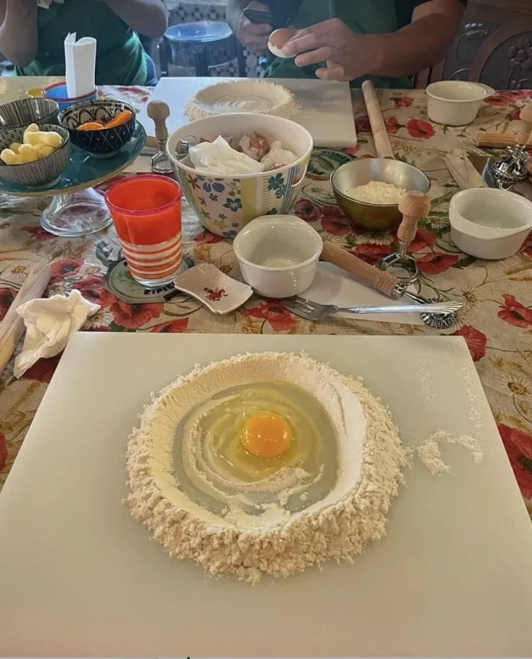 Egg in flour on a poppy tablecloth